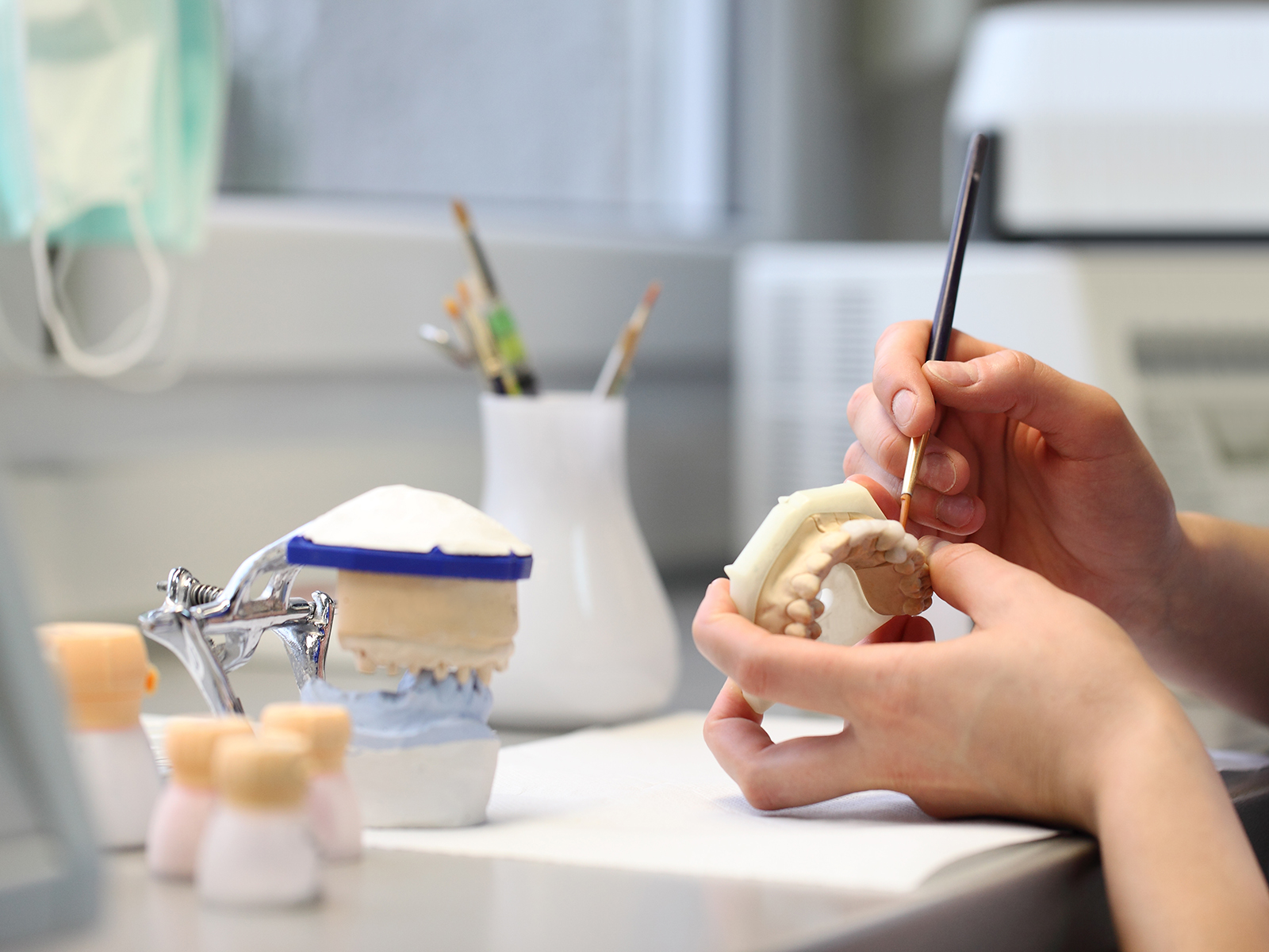 What is the difference between the different types of dentures?