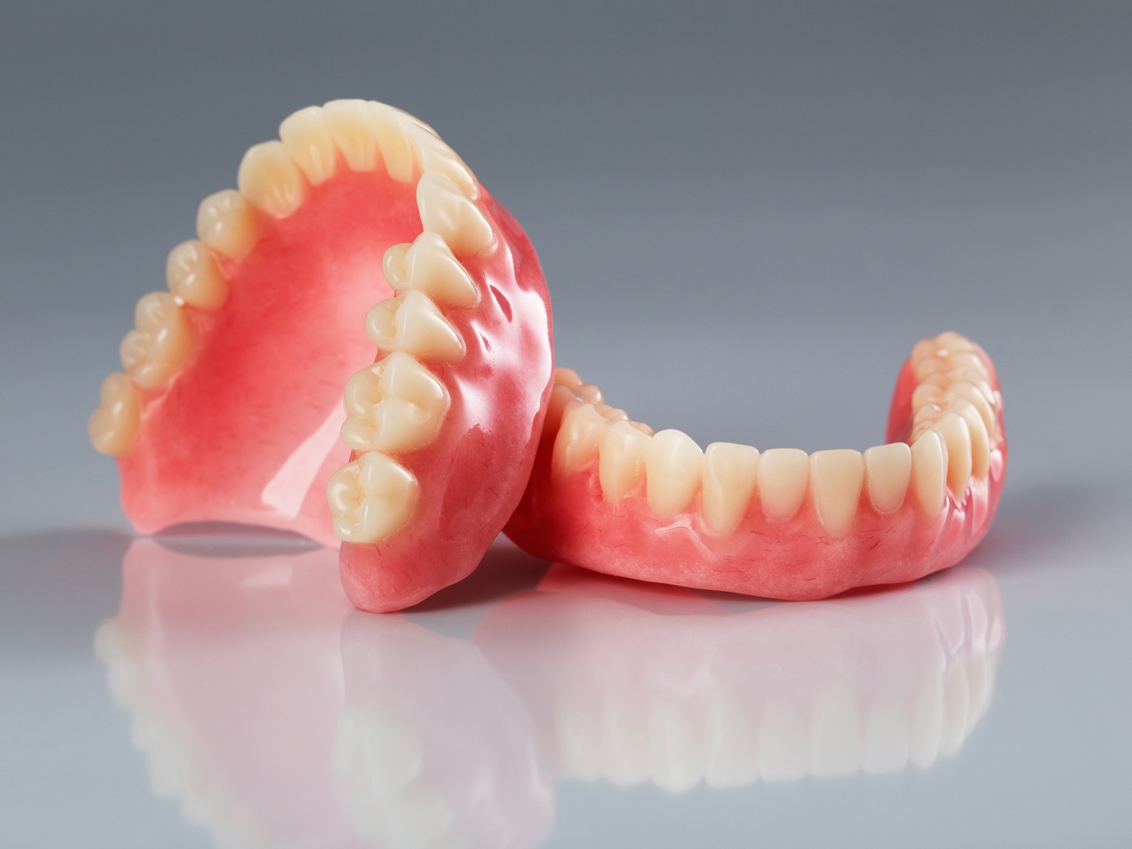 Are permanent dentures better than temporary?