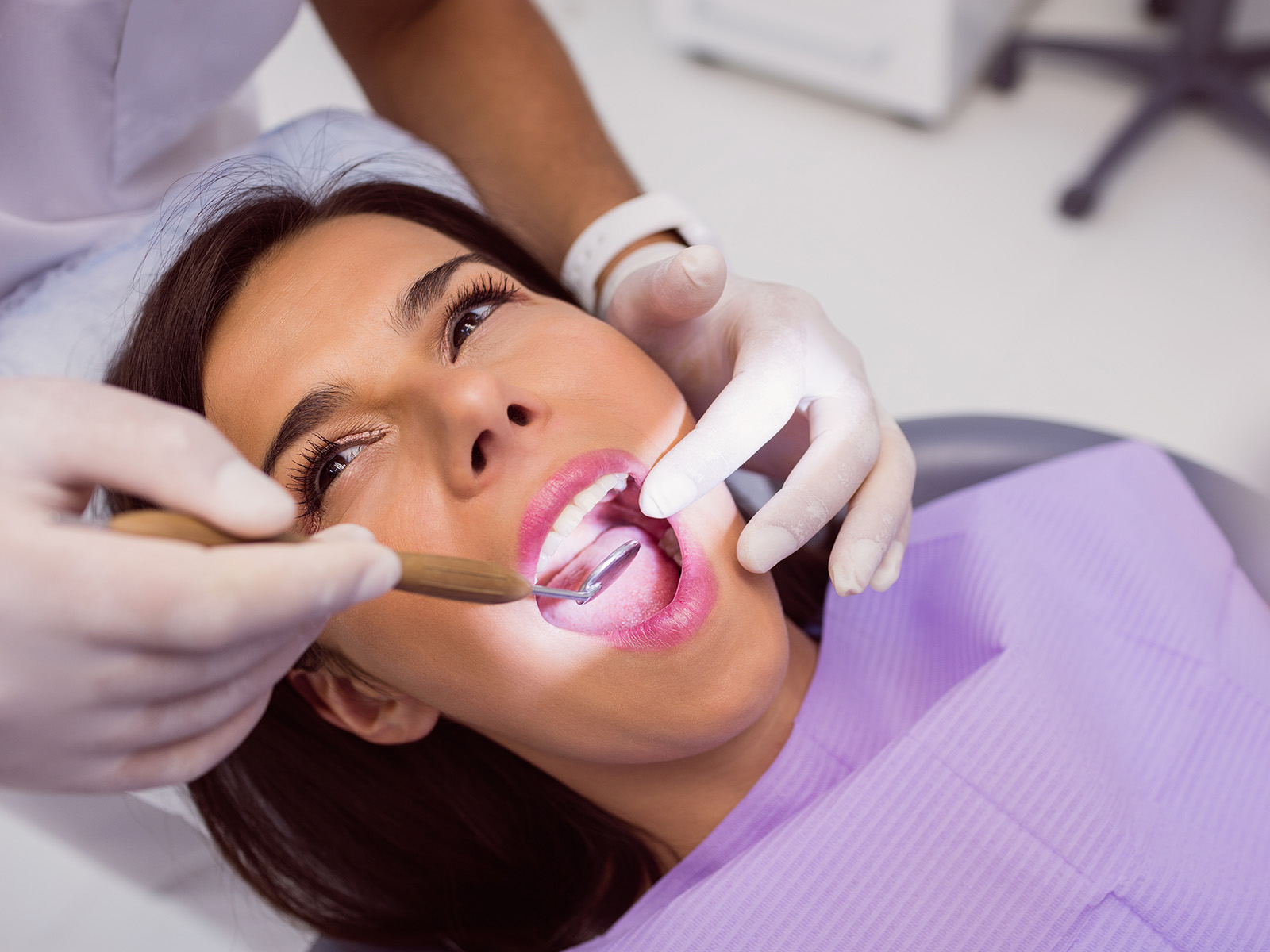 What Are The Pros And Cons of Dental Fluoride Treatments?